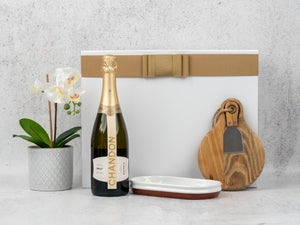 Sparkling Celebration Hamper: Selection of fine wines, elegant serveware essentials. Perfect for festive gatherings!