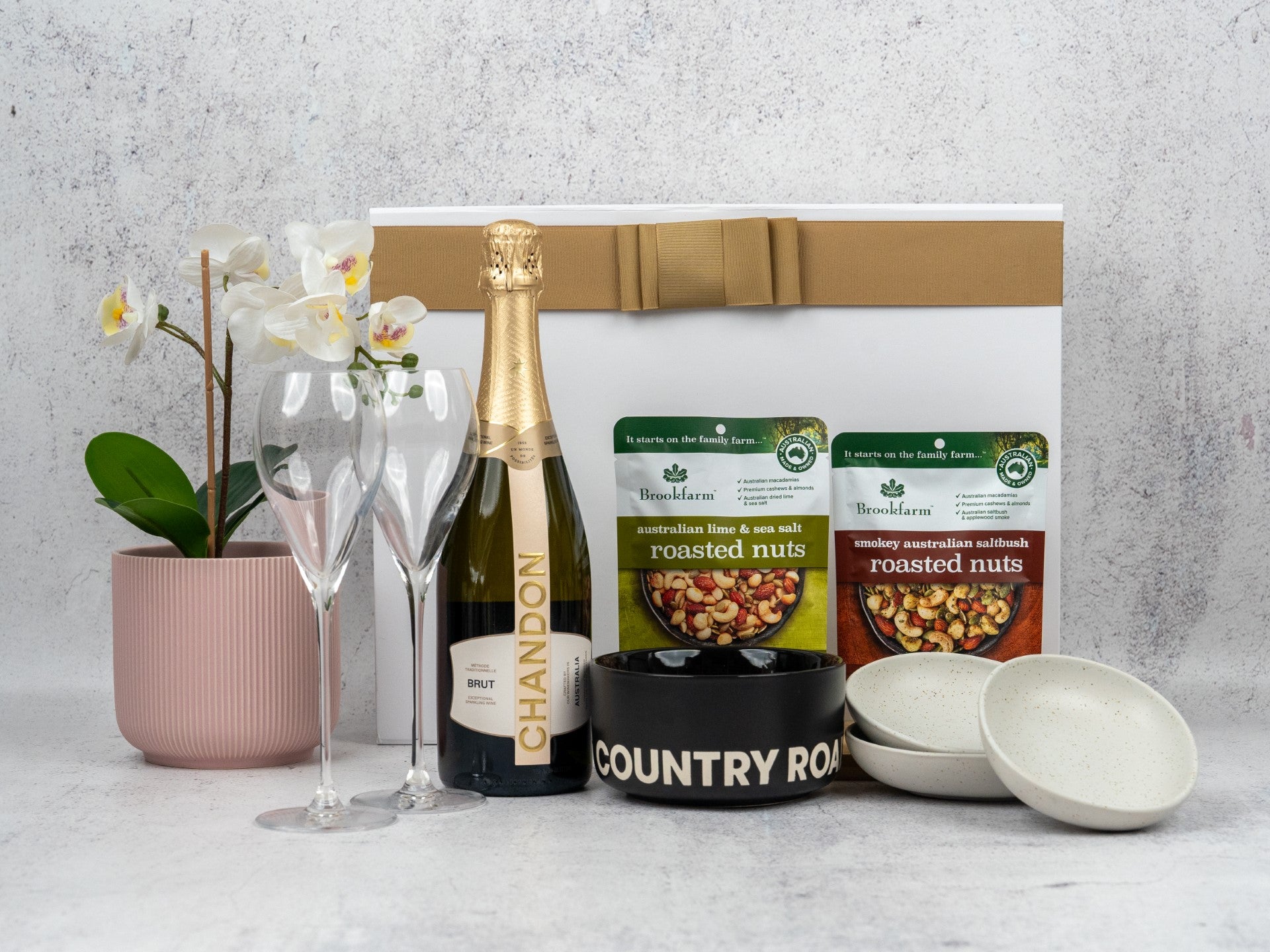 Elegant Gourmet Sparkling Hamper: curated wines, chic glassware, and premium Australian roasted nuts. Perfect indulgence!