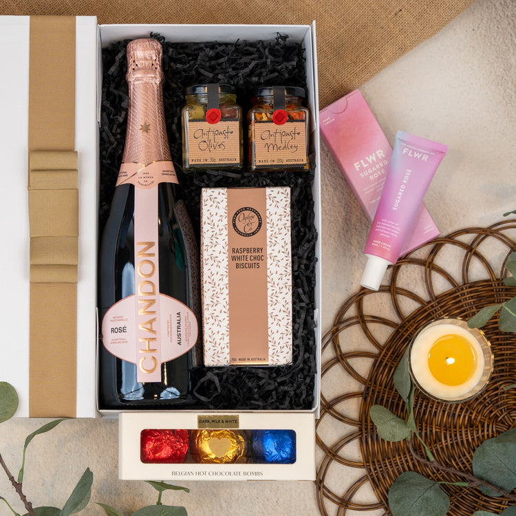 Luxurious Chandon Rosé hamper with gourmet antipasto and indulgent chocolate treats for the perfect celebration! 🥂🍫